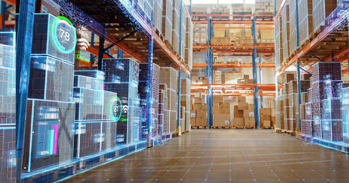 image of warehouse with digital overlay of numbers, graphs, and lines to illustrate inventory and order data