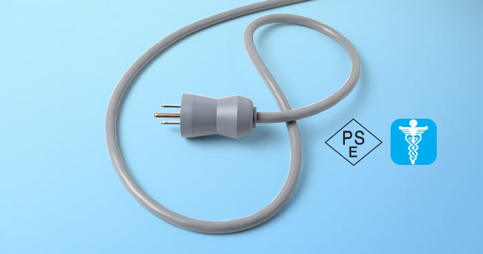new Interpower Japanes hospital-grade power cord featured on blue background with PSE approval marking and Hospital-grade-mark.